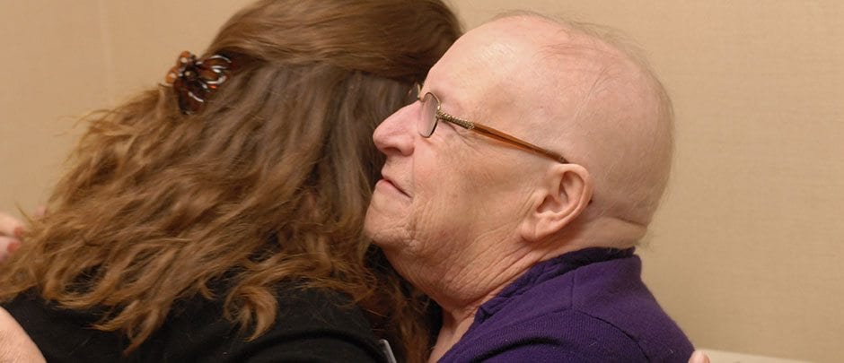 Donor support is giving a hug to a patient in need.