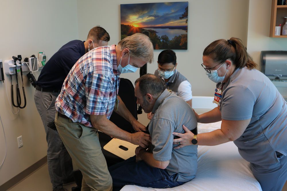 Donor support is giving a hug to a patient in need.